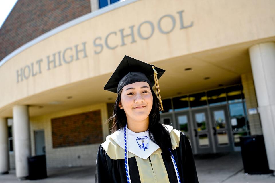 Holt High School graduate Halim Tran on Tuesday, May 30, 2023, outside the high school in Holt.