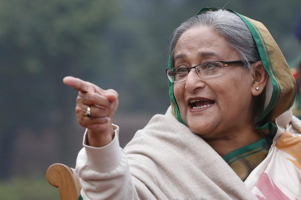 Bangladesh's Prime Minister Sheikh Hasina gestures as she speaks during a press conference in Dhaka, Bangladesh, Monday, Jan. 6, 2014. On Monday, her ruling Awami League party won one of the most violent elections in the country's history, marred by street fighting, low turnout and a boycott by the opposition that made the results a foregone conclusion. (AP Photo/Rajesh Kumar Singh)