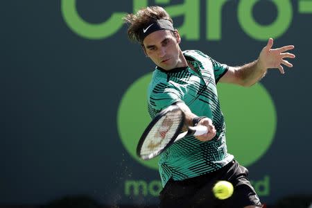 Mar 27, 2017; Miami, FL, USA; Roger Federer of Switzerland hits a forehand against Juan Martin del Potro of Argentina (not pictured) on day seven of the 2017 Miami Open at Crandon Park Tennis Center. Federer won 6-3, 6-4. Mandatory Credit: Geoff Burke-USA TODAY Sports