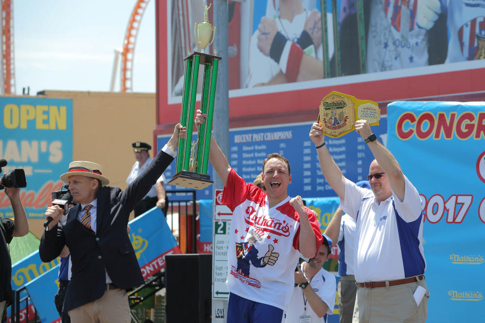 <p>Joey Chestnut is named winner of the Nathan’s Famous Fourth of July International Hot Dog-Eating Contest at Coney Island in Brooklyn, New York City, U.S., July 4, 2017. (Andrew Kelly/Reuters) </p>