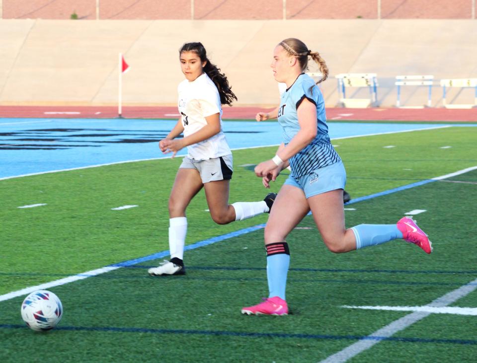 Pueblo West's Jocelyn Thompson dribbles by Pueblo South's Kyla Cruz in a game held on Apr 4, 2024 at Pueblo West High School.