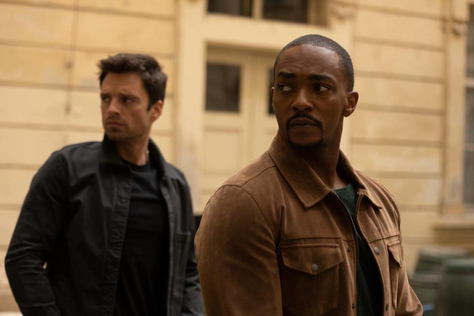 Sebastian Stan and Anthony Mackie looking back