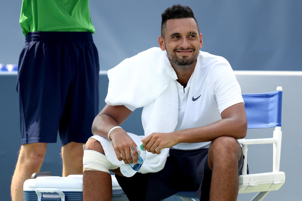 Australian Nick Kyrgios forgot to bring his tennis shoes down to the court with him on Tuesday for his Round of 64 match at the Cincinnati Masters. (Getty Images)