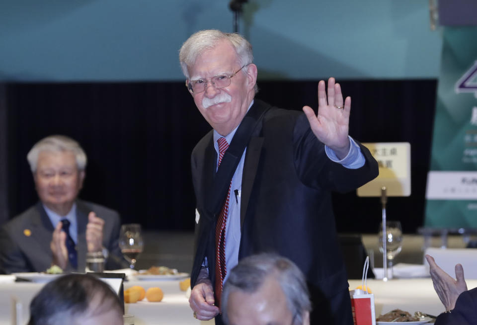 Former US national security advisor John Bolton waves at the 40th anniversary celebration of Formosan Association for Public Affairs in Taipei, Taiwan, Monday, May 1, 2023. (AP Photo/ Chiang Ying-ying)