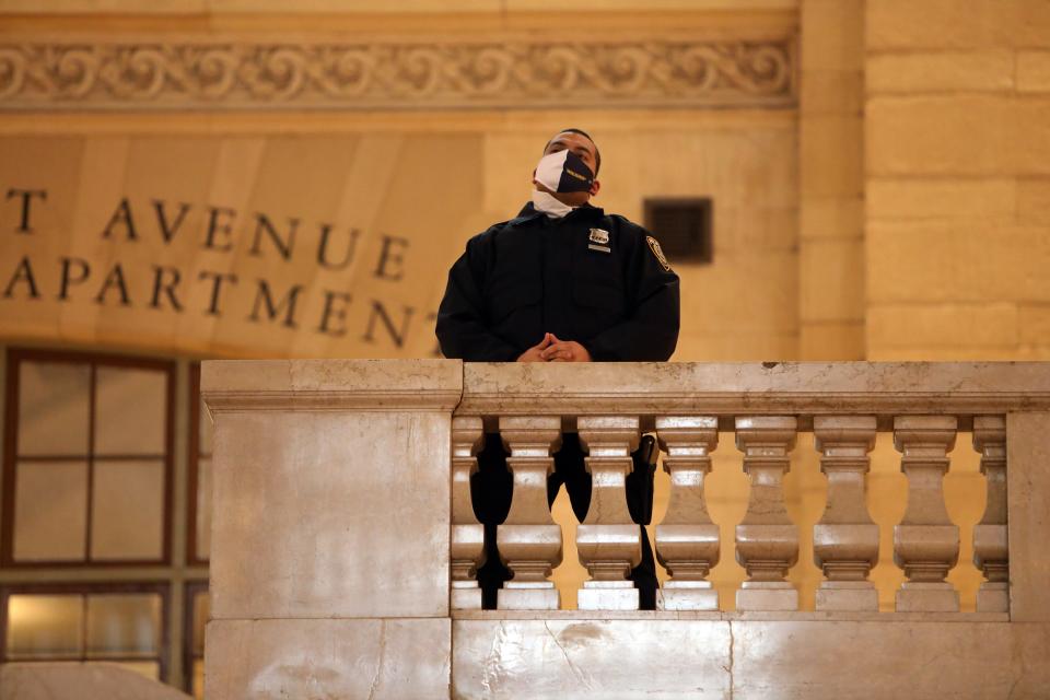 An MTA police officer watches over Grand Central Station on April 27 in Manhattan.