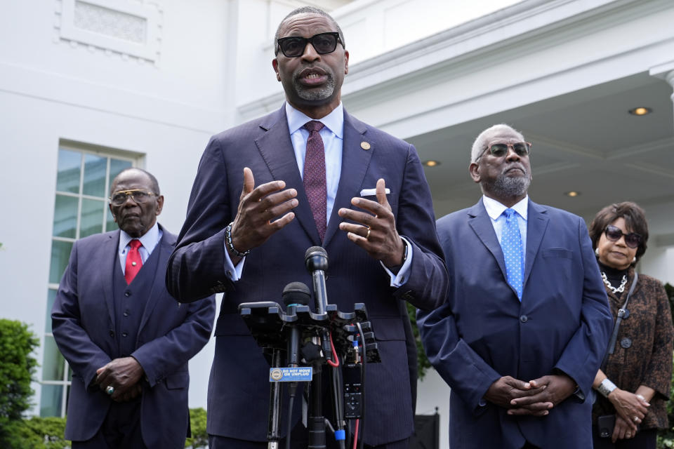 NAACP President Derrick Johnson, second from left, speaks to reporters outside the White House in Washington, Thursday, May 16, 2024, after meeting with President Joe Biden to mark the 50th anniversary of the historic Supreme Court decision. Johnson is joined by, from left, Brown v. Board of Education plaintiff and veteran John Stokes, Nathaniel Briggs, son of Brown v. Board of Education named plaintiff Harry Briggs Jr., and Cheryl Brown Henderson, daughter of Brown v. Board of Education named plaintiff Oliver Brown. (AP Photo/Susan Walsh)