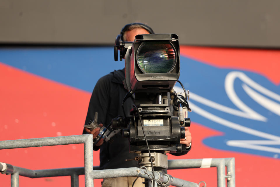 LONDON, ENGLAND - AUGUST 21: A TV Cameraman working ahead of the Premier League match between Crystal Palace and Arsenal FC at Selhurst Park on August 21, 2023 in London, England. (Photo by Matthew Ashton - AMA/Getty Images)