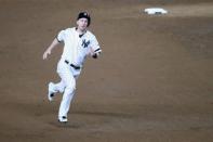 Oct 17, 2017; Bronx, NY, USA; New York Yankees third baseman Todd Frazier (29) runs to third base against the Houston Astros during the eighth inning in game four of the 2017 ALCS playoff baseball series at Yankee Stadium. Mandatory Credit: Anthony Gruppuso-USA TODAY Sports