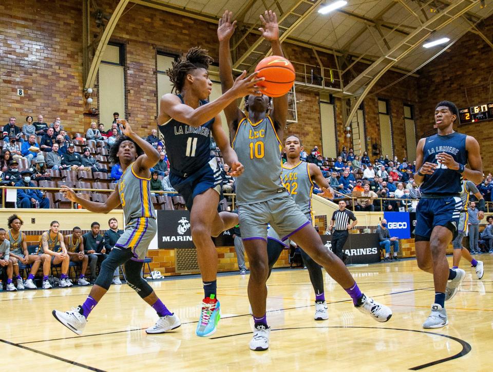 La Lumiere's Jeremy Fears Jr. keeps the ball in bounds during the LaLumiere vs. Legacy Early College NIBC Tournament basketball game Thursday, Jan. 6, 2022 at the LaPorte Civic Auditorium. 