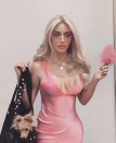 <p>We love this pretty-in-pink Elle Woods costume from <em><a href="https://www.amazon.com/Legally-Blonde-Reese-Witherspoon/dp/B000VCLGBY?tag=syn-yahoo-20&ascsubtag=%5Bartid%7C10055.g.23653854%5Bsrc%7Cyahoo-us" rel="nofollow noopener" target="_blank" data-ylk="slk:Legally Blonde;elm:context_link;itc:0;sec:content-canvas" class="link ">Legally Blonde</a></em> that Kim Kardashian wore. (Just make sure to bend and snap!)</p>