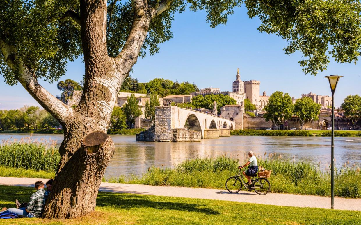 Cyclist on the banks of the Rhone - Getty