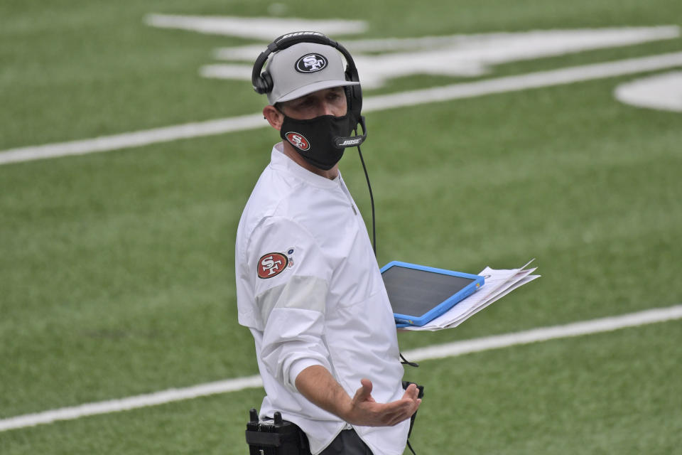 San Francisco 49ers head coach Kyle Shanahan works on the sidelines during the second half of an NFL football game against the New York Giants, Sunday, Sept. 27, 2020, in East Rutherford, N.J. (AP Photo/Bill Kostroun)