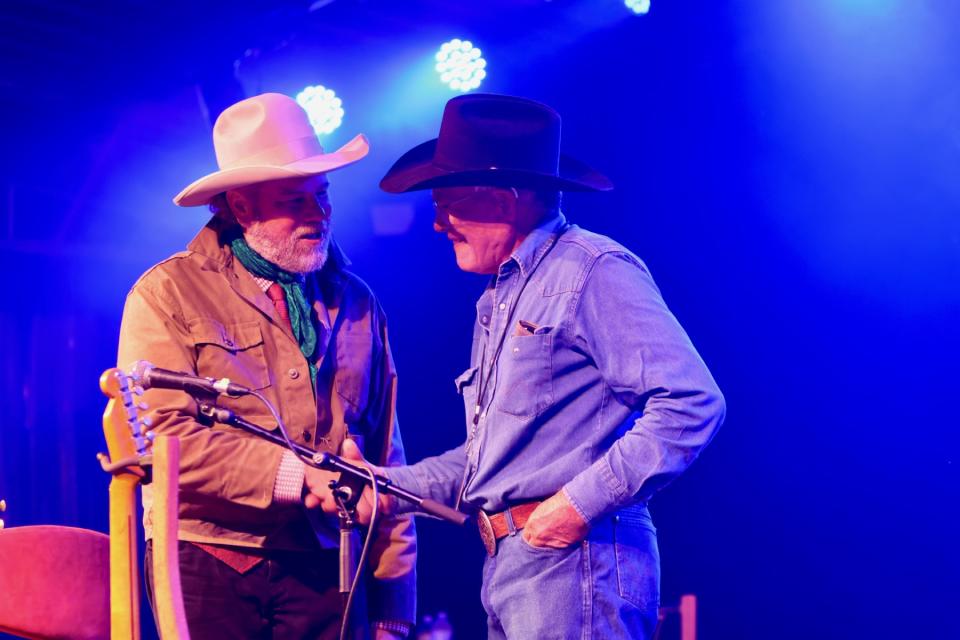 Robert Earl Keen and rodeo champ Phil Lyne on Saturday night at Floore’s Country Store in Helotes, Texas. (Alison Lundy*)