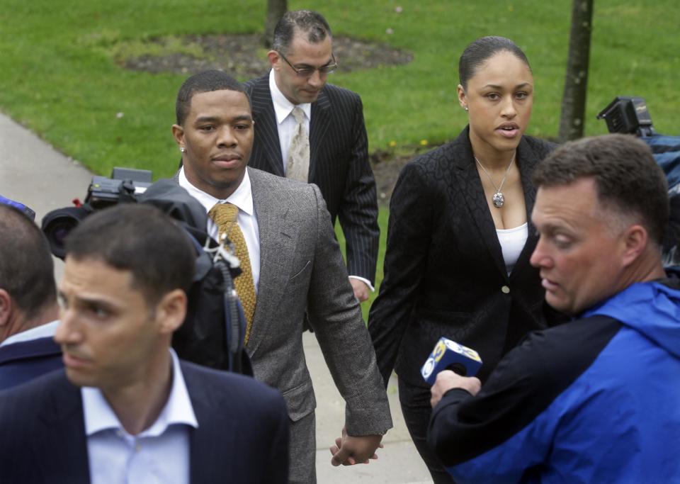 Baltimore Ravens football player and former Rutgers University standout, Ray Rice holds hands with his wife Janay Palmer as they arrive at Atlantic County Criminal Courthouse in Mays Landing, N.J., Thursday, May 1, 2014. After Rice and Janay Palmer got into a physical altercation on Feb. 15 at an Atlantic City casino, both were charged with simple assault-domestic violence. (AP Photo/Mel Evans)