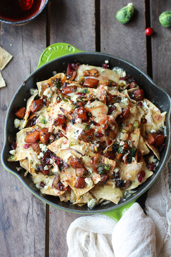 <strong>Get the <a href="http://www.halfbakedharvest.com/cranberry-butternut-brussels-sprout-brie-skillet-nachos/" target="_blank">Cranberry, Butternut And Brussels Sprout Brie Skillet Nachos recipe</a> from Half Baked Harvest</strong>