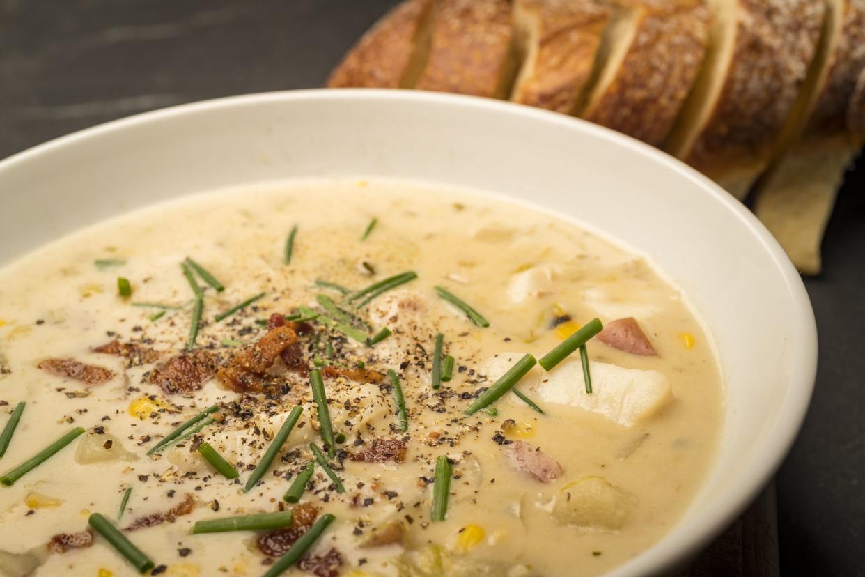 Photograph showing a bowl of fresh home made corn chowder.