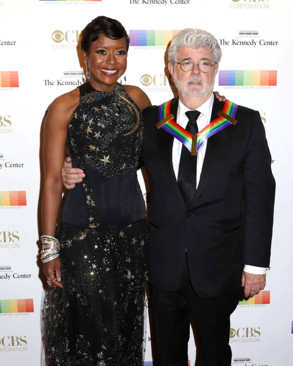 Honoree George Lucas with his wife, Mellody Hobson (wearing Valentino), at the 38th Annual Kennedy Center Honors at The Kennedy Center Hall of States in Washington, DC. 