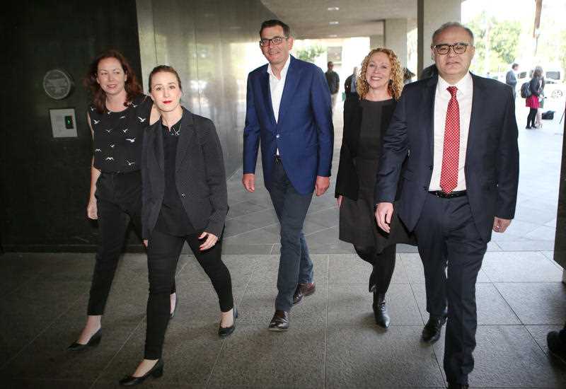 Jaclyn Symes, Gabrielle Williams, Victorian Premier Daniel Andrews, Melissa Horne and Adem Somyurek are seen during a press conference in Melbourne in 2018.