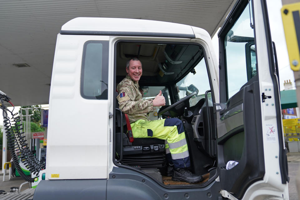 <p>A member of the armed forces sits in the cab of a tanker after helping to deliver fuel to a garage in Waltham Abbey, Essex. Picture date: Tuesday October 5, 2021.</p>
