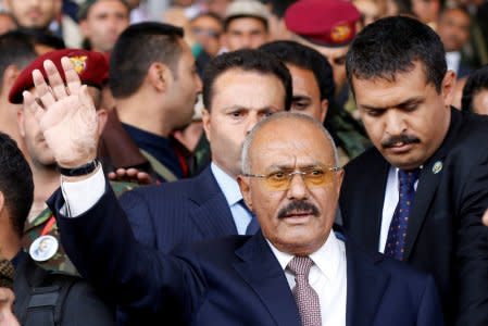 FILE PHOTO Yemen's former President Ali Abdullah Saleh gestures to supporters as he arrives to a rally held to mark the 35th anniversary of the establishment of his General People's Congress party in Sanaa, Yemen August 24, 2017. REUTERS/Khaled Abdullah/File Photo