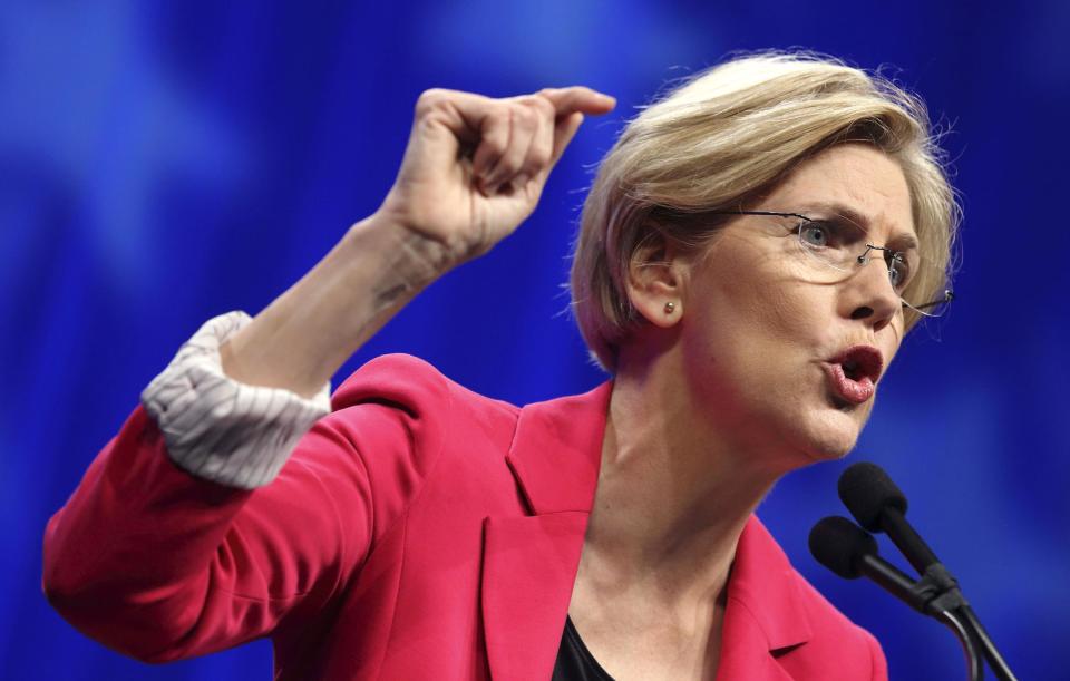 FILE - In this June 2, 2012 file photo, Massachusetts Democratic Senate candidate Elizabeth Warren speaks in Springfield, Mass. Massachusetts Sen. Scott Brown has spent weeks fanning questions about Democratic rival Elizabeth Warren's claim of Native American heritage on the campaign trail, while Warren regularly paints Brown as a darling of Wall Street. The rhetoric is sometimes caustic, and all but invisible in the ad war being waged on Massachusetts television sets. (AP Photo/Michael Dwyer, File)