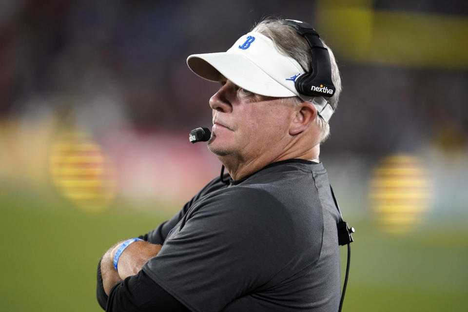 UCLA coach Chip Kelly watches from the sideline during the first half of the team's NCAA college football game against Fresno State on Saturday, Sept. 18, 2021, in Pasadena, Calif. (AP Photo/Marcio Jose Sanchez)