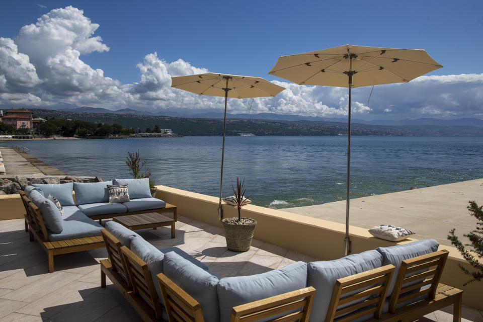 A view at the Adriatic sea from a lounge in Opatija, Croatia, Saturday, May 15, 2021. Croatia has opened its stunning Adriatic coastline for foreign tourists after a year of depressing coronavirus lockdowns and restrictions. (AP Photo/Darko Bandic)