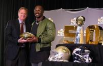 Feb 8, 2016; San Francisco, CA, USA; NFL commissioner Roger Goodell and Denver Broncos outside linebacker Von Miller hold the MVP Trophy during a press conference at the Super Bowl Media Center at Moscone Center-West. Mandatory Credit: Kelley L Cox-USA TODAY Sports