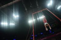 Manuel Almeida Campos of Portugal competes in the rings event during the men's gymnastics qualification in the North Greenwich Arena during the London 2012 Olympic Games July 28, 2012.