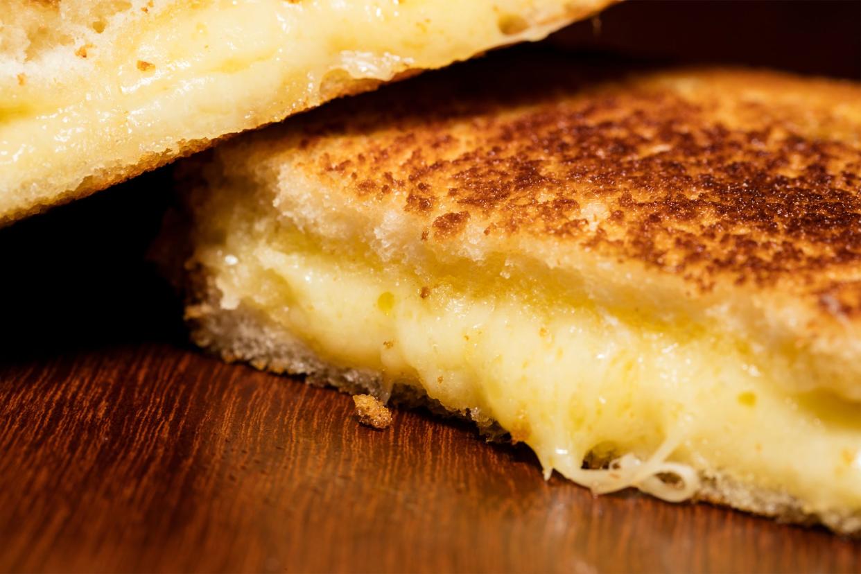 Closeup of melty grilled cheese sandwich
