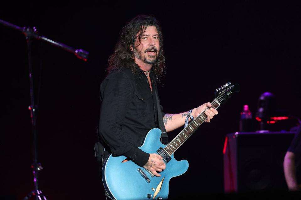 <p>Kevin Mazur/Getty</p> Dave Grohl of Foo Fighters performs during Sea.Hear.Now on September 17, 2023 in Asbury Park, New Jersey