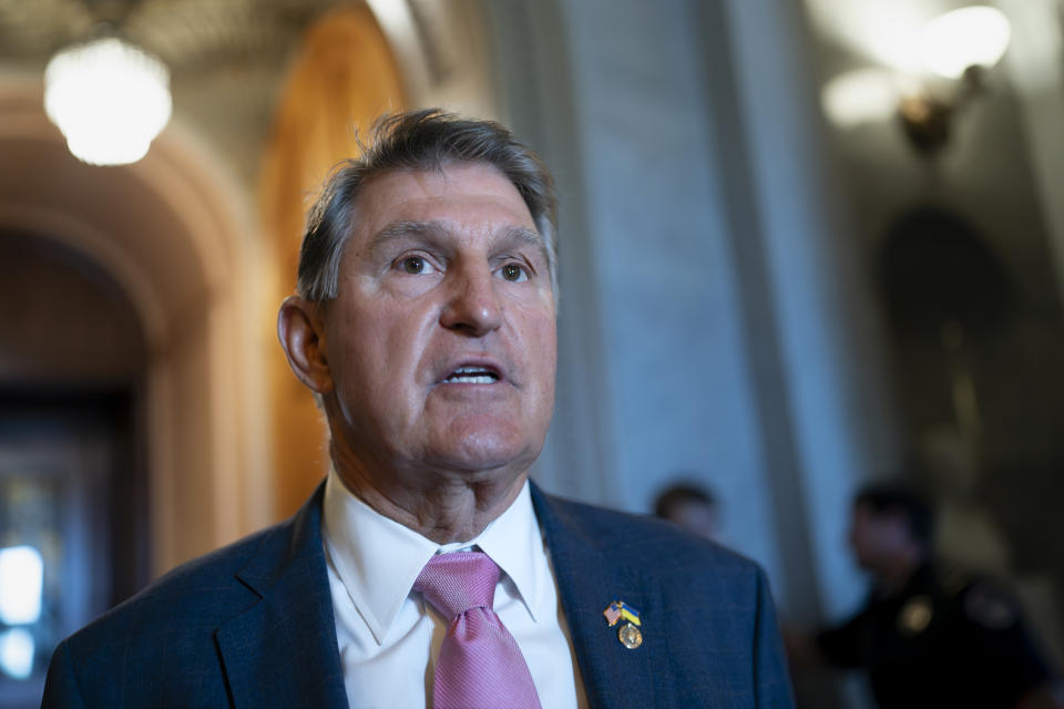 FILE - Sen. Joe Manchin, d-W.Va., speaks outside the chamber, at the Capitol in Washington, June 13, 2023. Manchin announced he won't seek reelection in 2024, giving Republicans a prime opportunity to pick up a seat in the heavily GOP state. (AP Photo/J. Scott Applewhite, File)