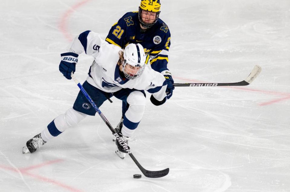 Penn State’s Christian Berger cuts around Michigan’s Jackson Hall during the game on Friday, Nov. 4, 2022 at Pegula Ice Arena.