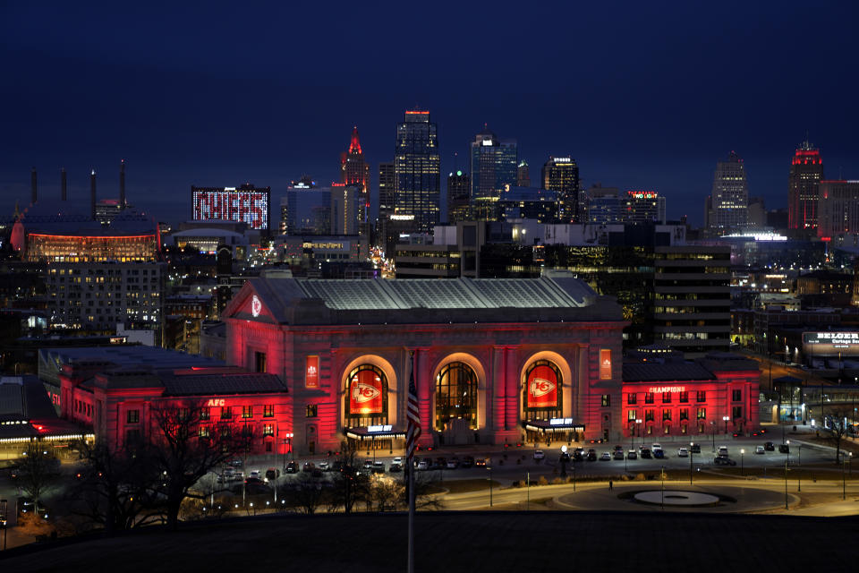 Union Station and other downtown Kansas City, Mo., buildings are lighted in red in support of the Kansas City Chiefs NFL football team Thursday, Feb. 1, 2024. The Chiefs will play the San Francisco 49ers in Super Bowl 58. (AP Photo/Charlie Riedel)