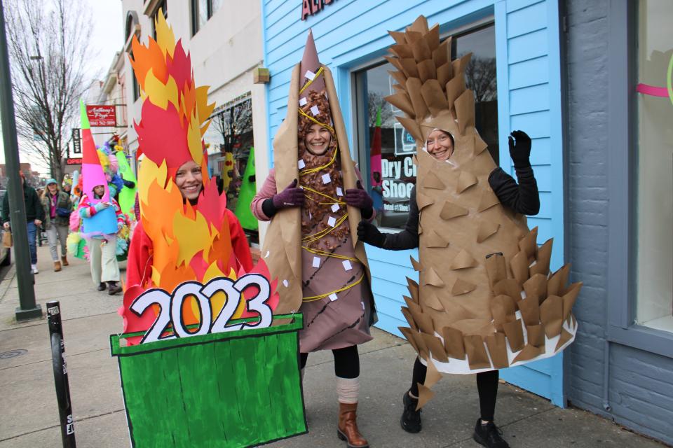 From left to right, Richmond residents Fox Clemmer, Rae Steuber and Andrea Teter walk in the 2024 Cone Parade.