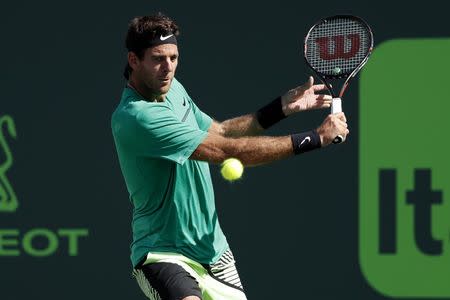 FILE PHOTO - Mar 27, 2017; Miami, FL, USA; Juan Martin del Potro of Argentina hits a backhand against Roger Federer of Switzerland (not pictured) on day seven of the 2017 Miami Open at Crandon Park Tennis Center. Federer won 6-3, 6-4. Mandatory Credit: Geoff Burke-USA TODAY Sports