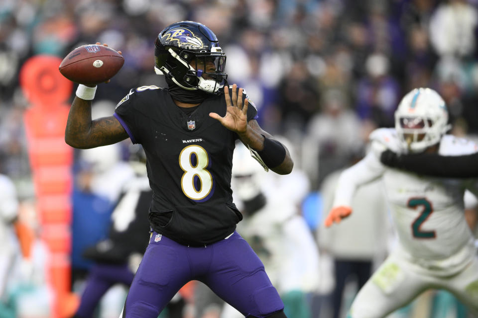 Baltimore Ravens quarterback Lamar Jackson (8) looks to pass against the Miami Dolphins during the second half of an NFL football game in Baltimore, Sunday, Dec. 31, 2023. (AP Photo/Nick Wass)