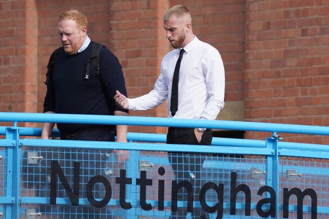 Oli McBurnie, right, attends Nottingham Magistrates' Court in August 2022