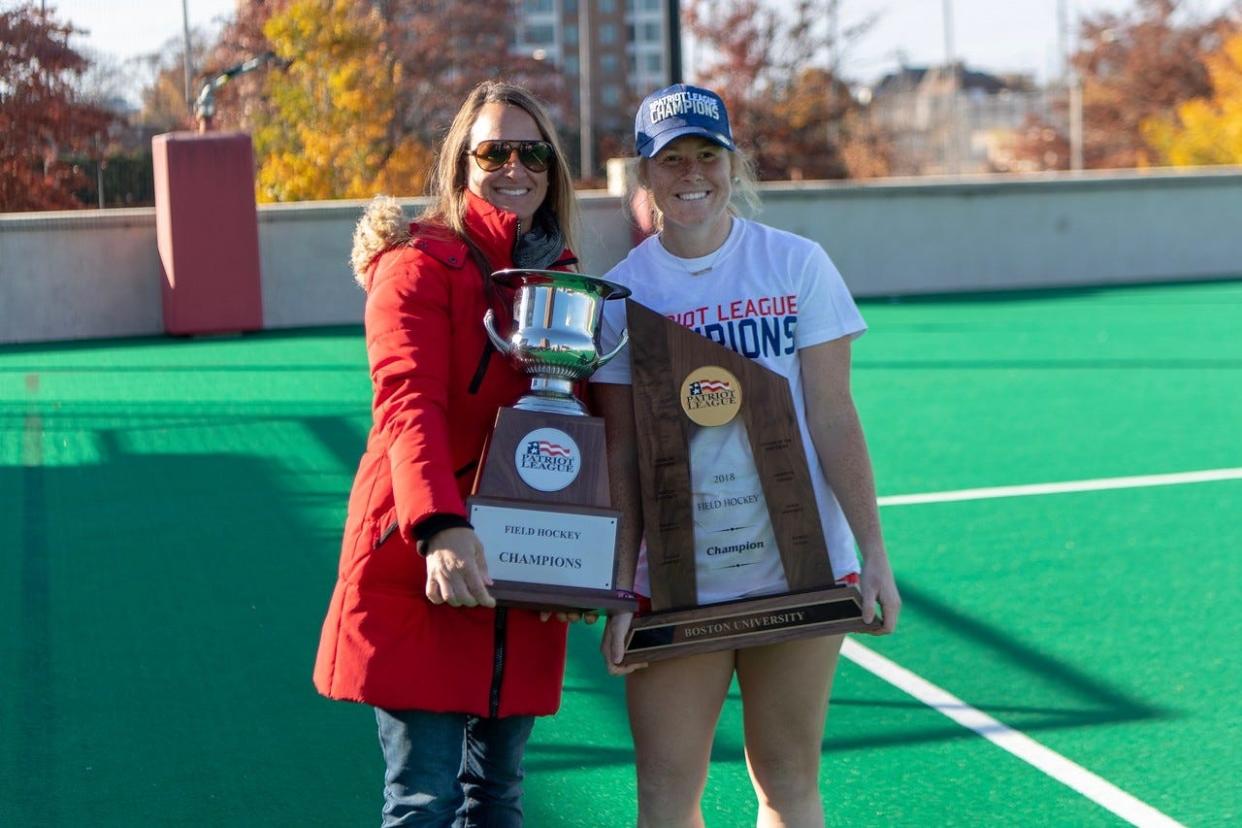 Former Duxbury High star Ally Hammel, right, poses with her mom Jennifer after winning the 2018 Patriot League field hockey championship with Boston University. Hammel now plays for the U.S. National Team that recently earned a spot in the 2024 Summer Olympics in Paris.