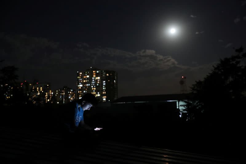 A supermoon rises in the sky in Santiago