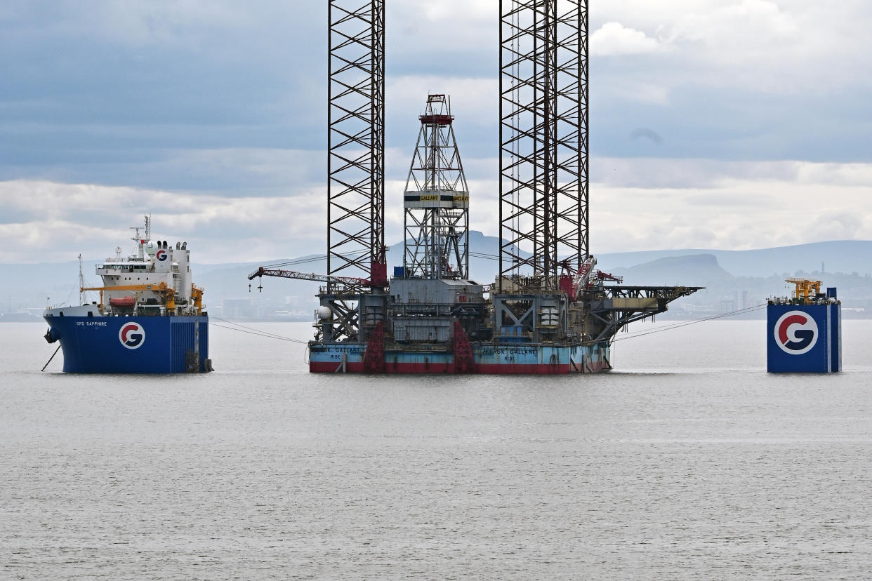 DALGETY BAY, SCOTLAND - MAY 28: The semi-submersible heavy lift vessel GPO Sapphire with an oil platform on her submerged load deck, off Burntisland in the Firth of Forth, on May 28, 2021 in Dalgety Bay, Scotland. GPO Sapphire is 225 metres long, and has a carrying capacity of over 60,000 DWT. (Photo by Ken Jack/Getty Images)