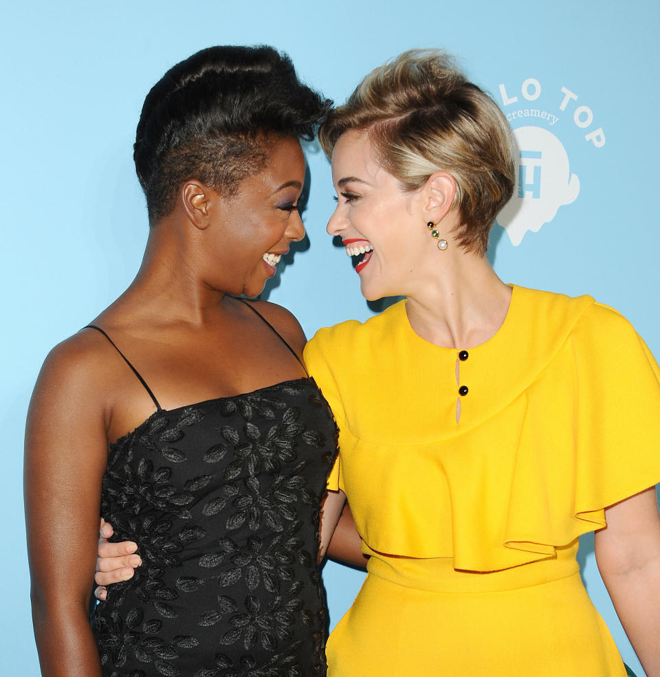 Samira Wiley and Lauren Morelli smile at the Variety and Women In Film's 2017 pre-Emmy celebration on September 15, 2017