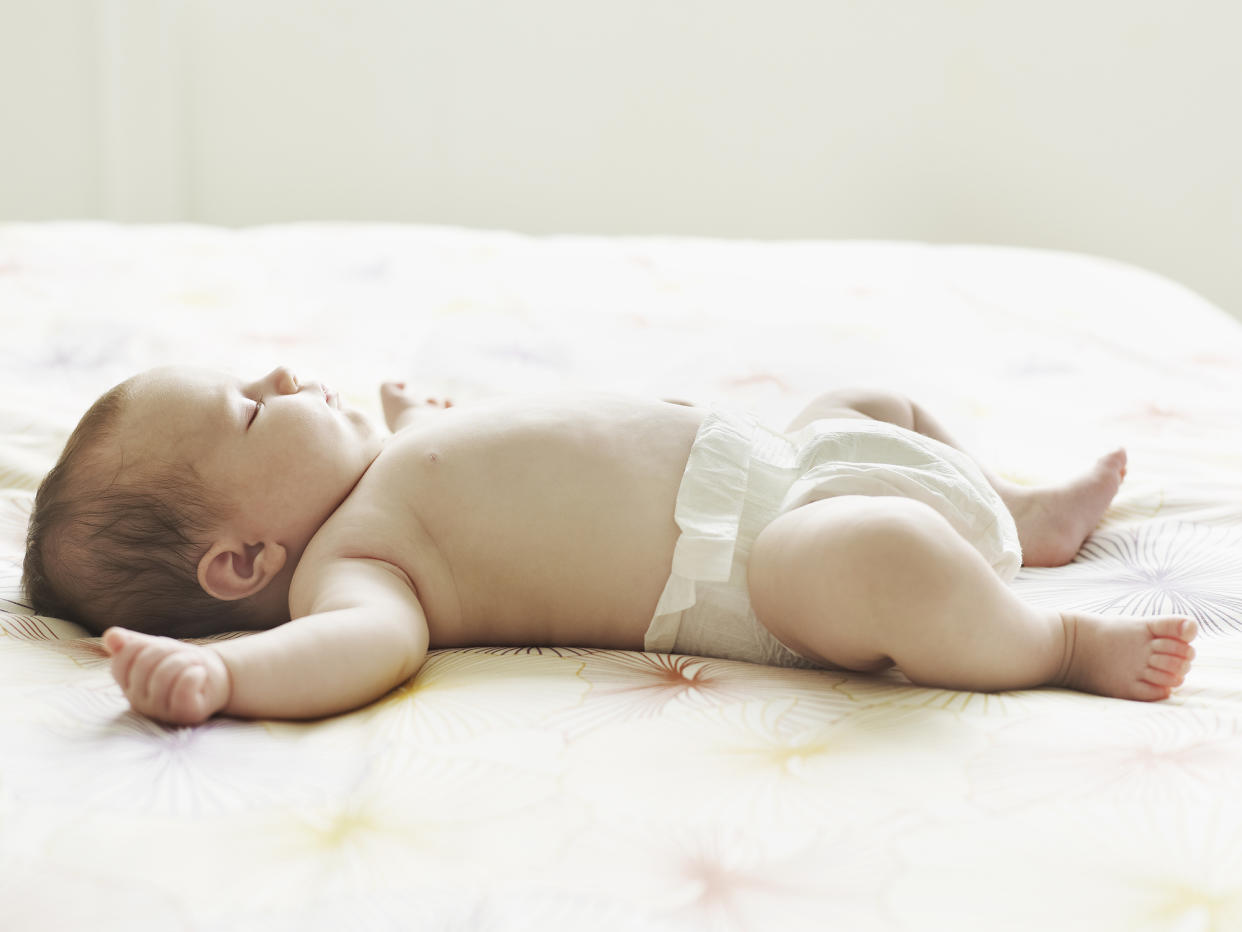 The Lullaby Trust has issued advice for parents about keeping babies cool in the heatwave [Photo: Getty]