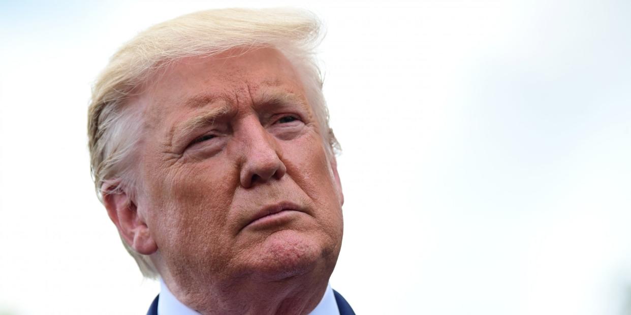 FILE PHOTO - U.S. President Donald Trump speaks to reporters as he departs for travel to North Carolina from the White House in Washington, U.S., September 9, 2019. REUTERS/Erin Scott