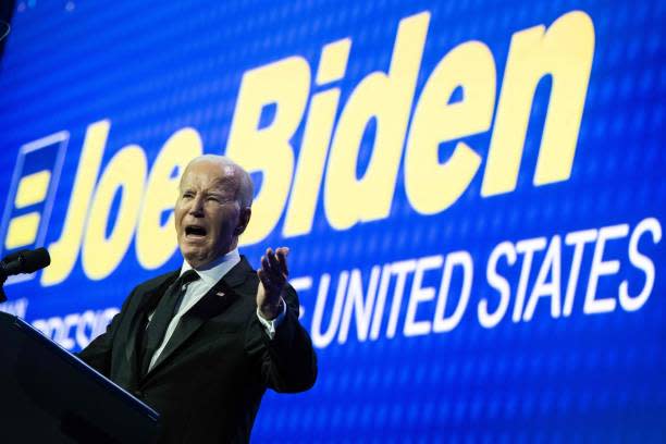 US president Joe Biden speaks during the Human Rights Campaign National Dinner at the Washington Convention Center in Washington, DC, on 14 October 2023 (AFP via Getty Images)