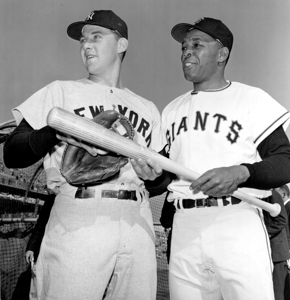 In this Oct. 4, 1962, file photo, Tom Tresh, left, of the New York Yankees, and Willie Mays, of the San Francisco Giants, talk before the first game of the World Series in San Francisco.