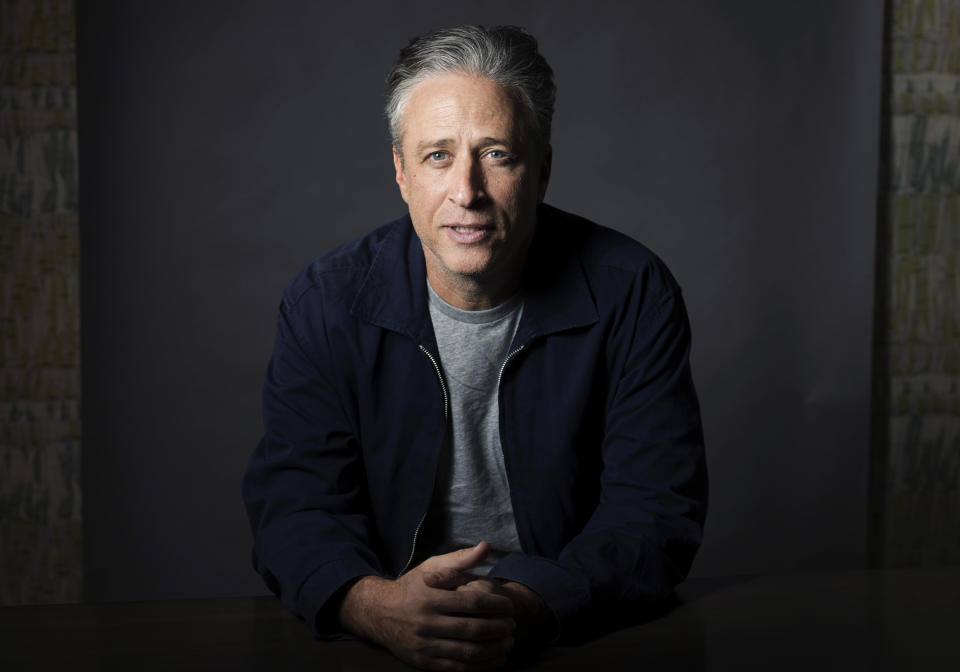 FILE - In this Nov. 7, 2014 file photo, Jon Stewart poses for a portrait in New York. Stewart directed the comedy "Irresistible," starring Rose Byrne and fellow "The Daily Show with Jon Stewart" alum, Steve Carell. (Photo by Victoria Will/Invision/AP, File)