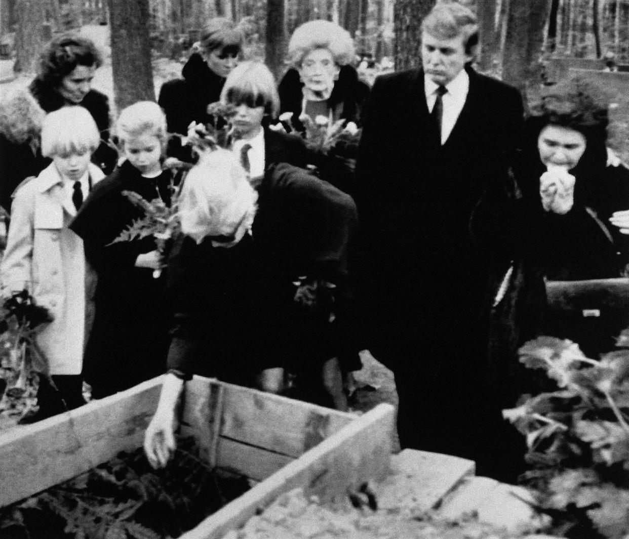 The funeral of Ivana Trump's father Milos Zelnicek in the Moravian town of Zlin, is pictured Oct. 1990. From left: Trump's children, Eric, 6, Ivanka, 8 and Donald, 12, Ivana and Donald Trump, and Marie Francová Zelnícek,, Ivana's mother.