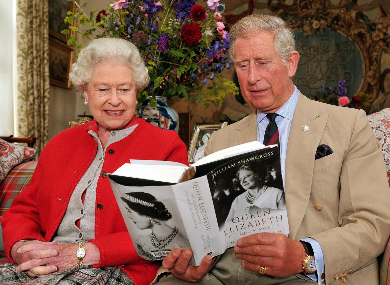 Queen Elizabeth II with Prince (now King) Charles. (Getty Images)