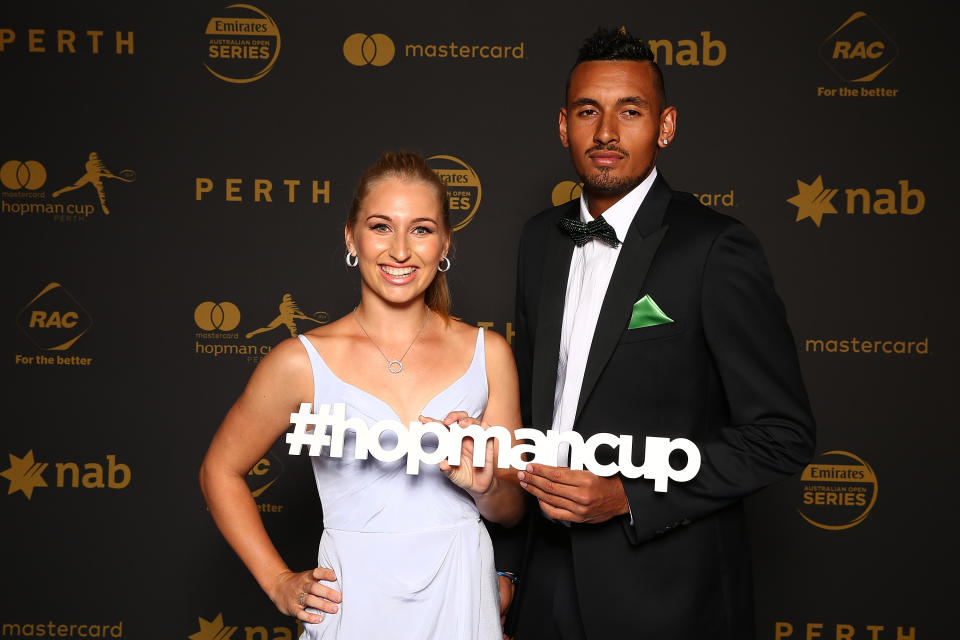 Daria Gavrilova and Nick Kyrgios pose for a photo.